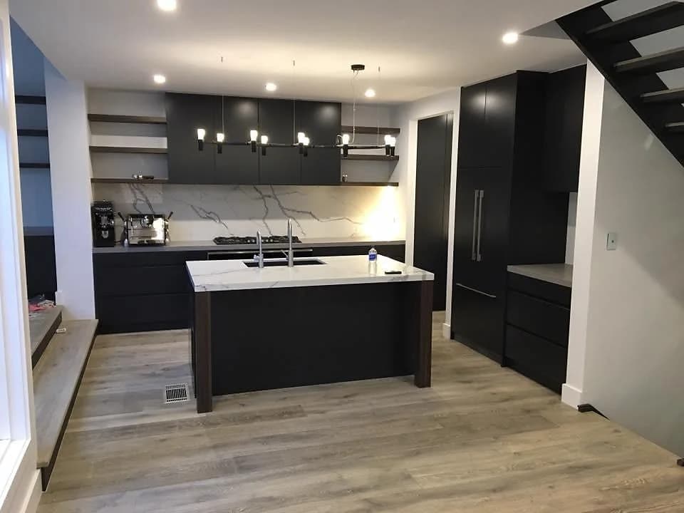 Completed Parramatta kitchen with black and white cabinetry and a large island
